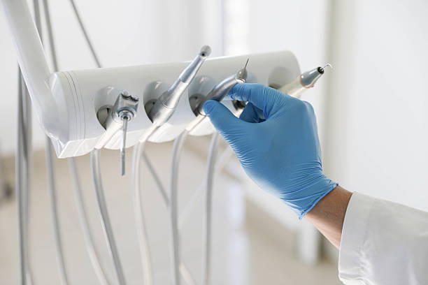 Professional Root Canal Treatment technician working in Manor, TX